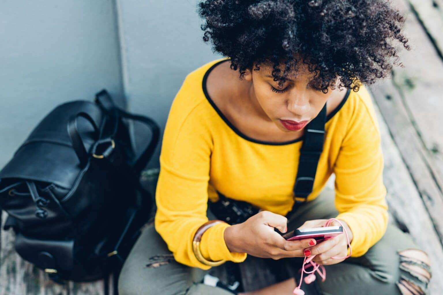 Black woman using smartphone