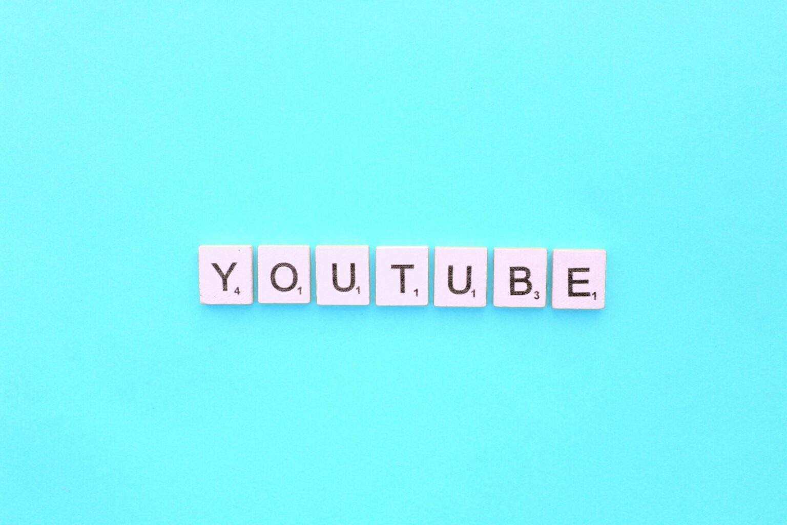 YouTube scrabble letters word on a light blue background