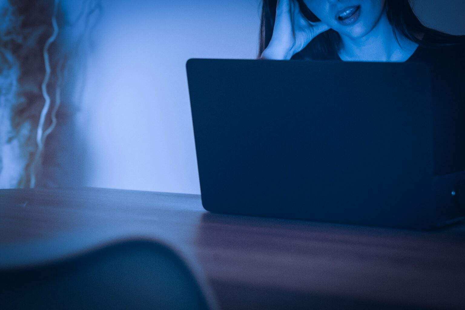 A woman relaxes and becomes aroused by watching adult content. Lonely woman watches porn