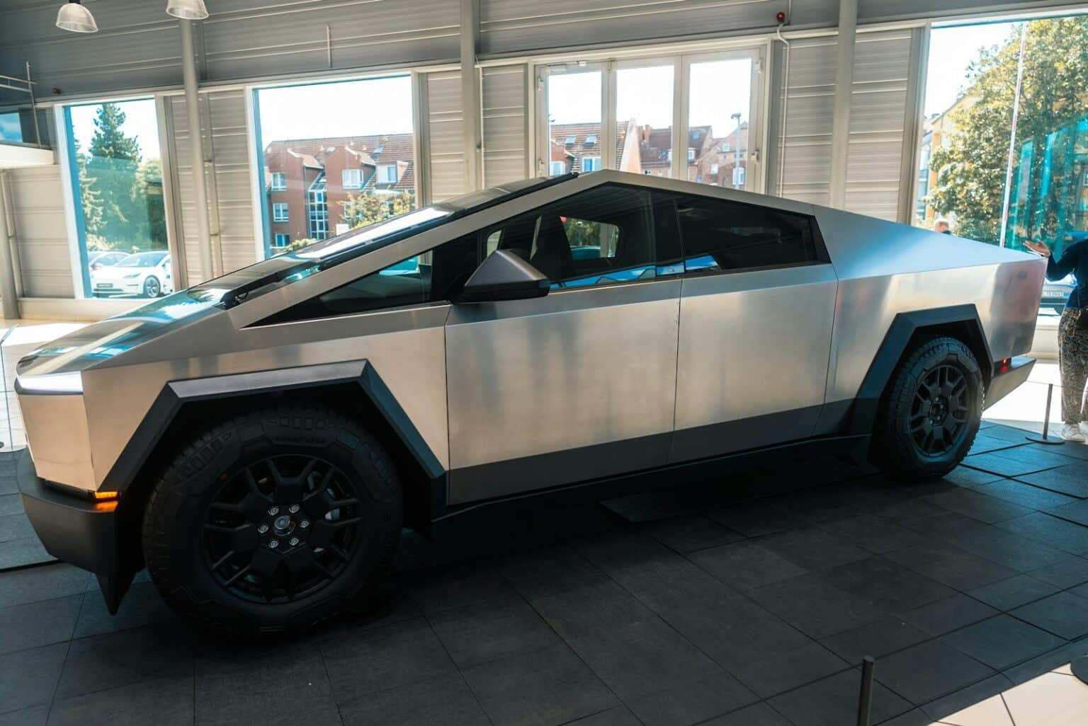 A futuristic car parked inside of a building