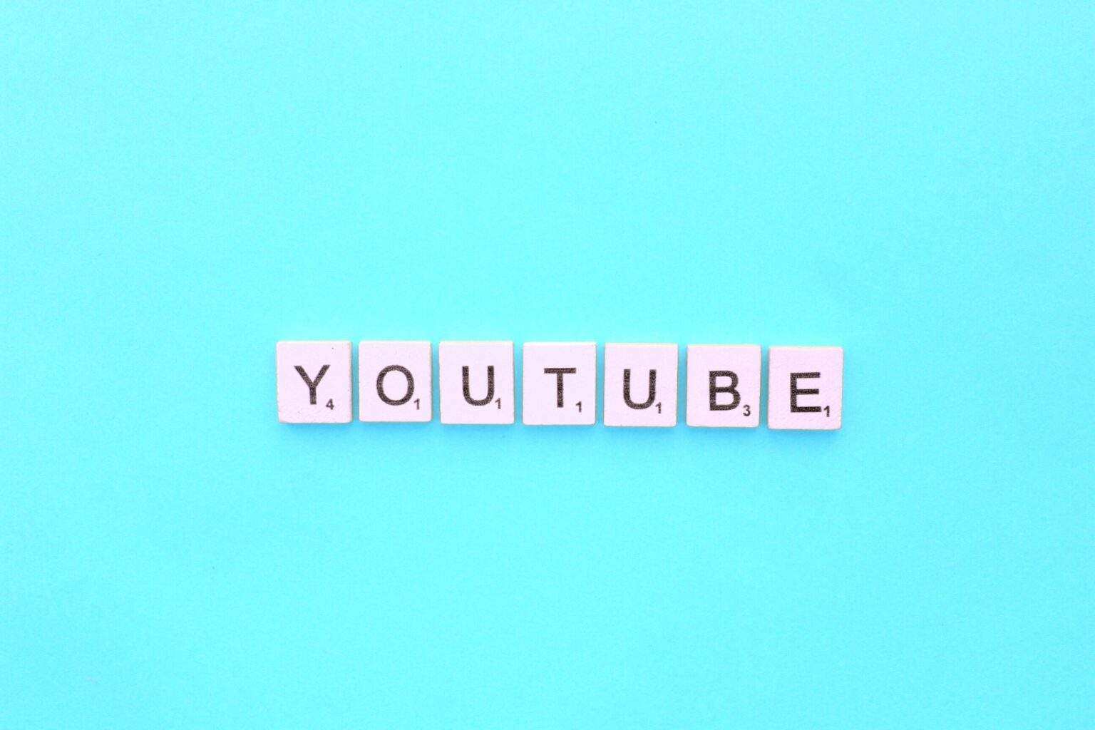 YouTube scrabble letters word on a light blue background