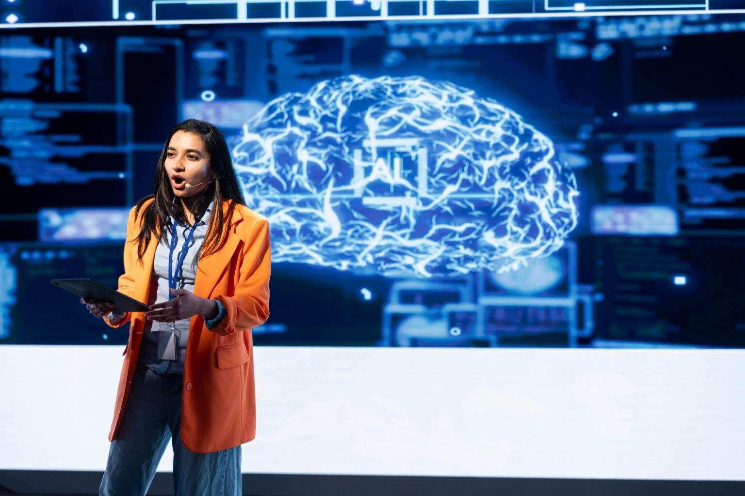 Technician using tablet during AI tech presentation