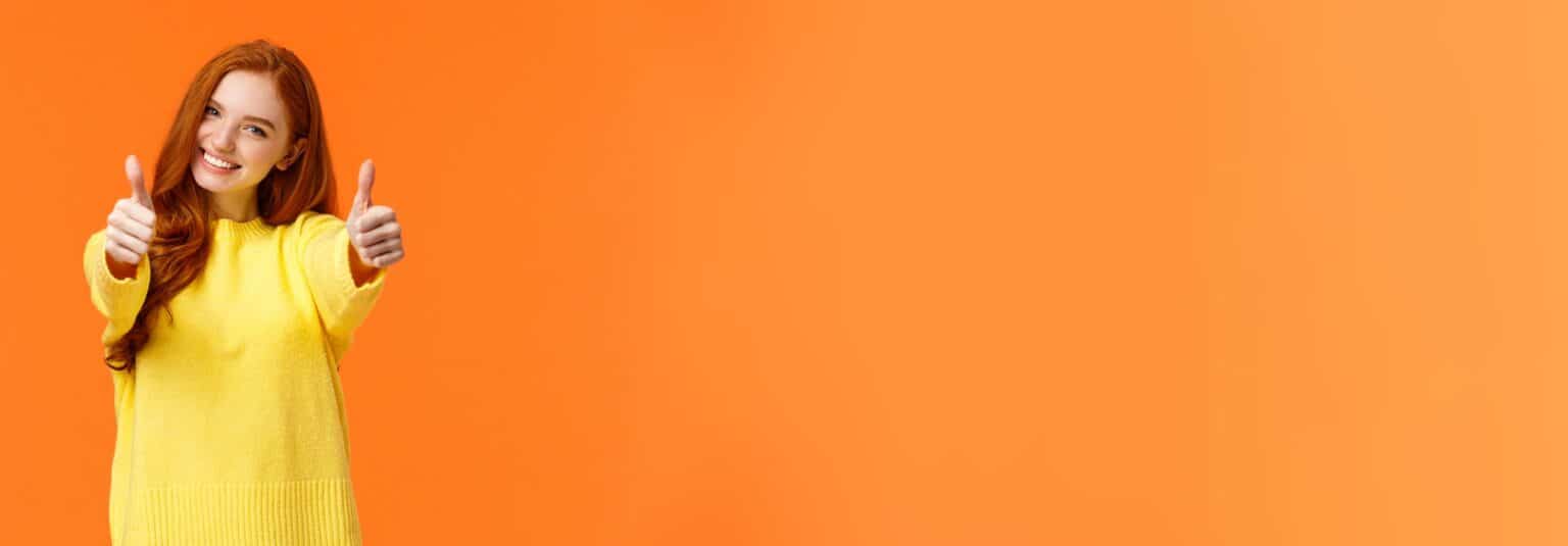 Good luck. Optimistic, confident cute redhead girlfriend encourage you, giving thumbs-up in like or