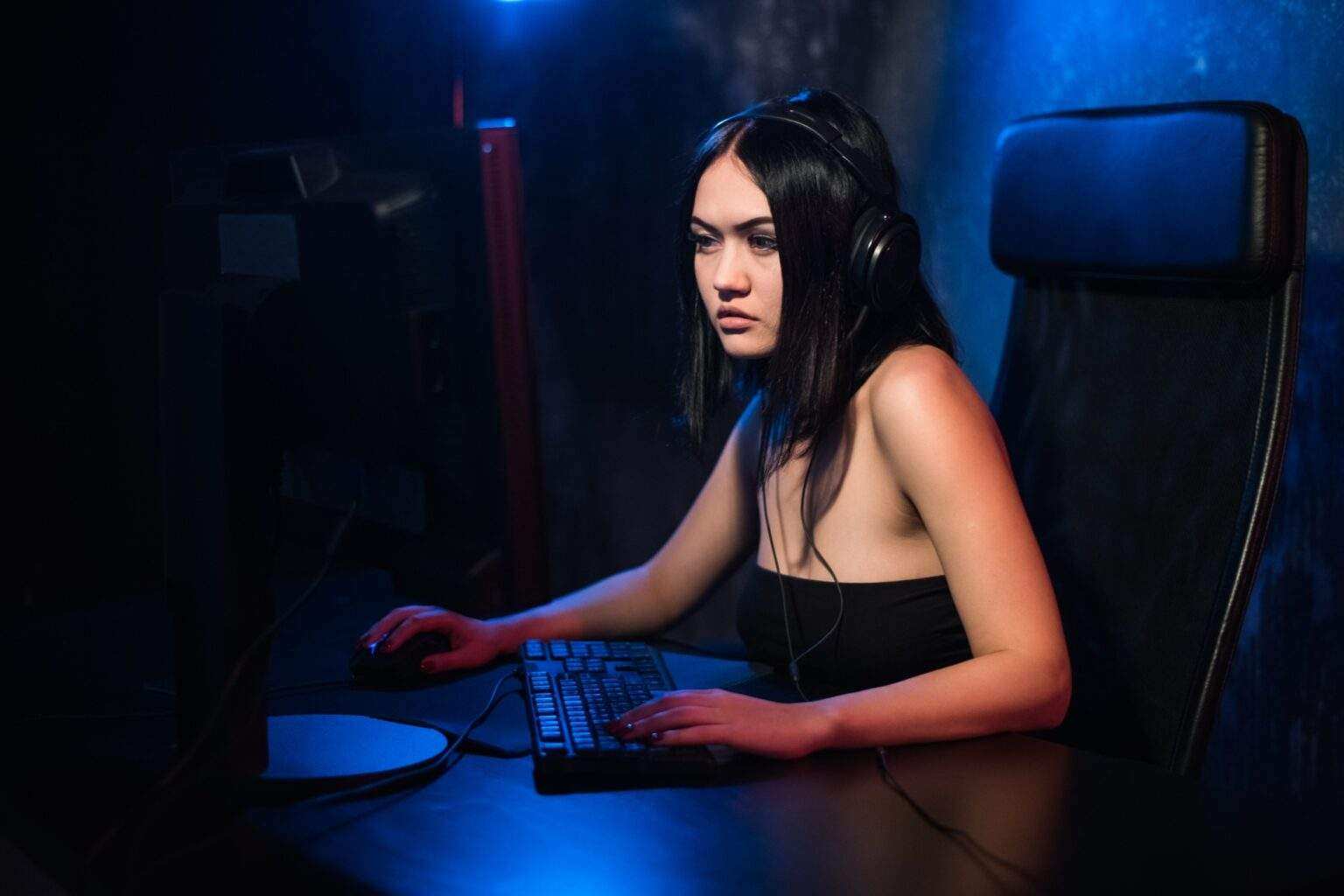 Beautiful Friendly Pro Gamer Girl Does Video Game Gameplay stream, Wearing Headset Talks and Chats