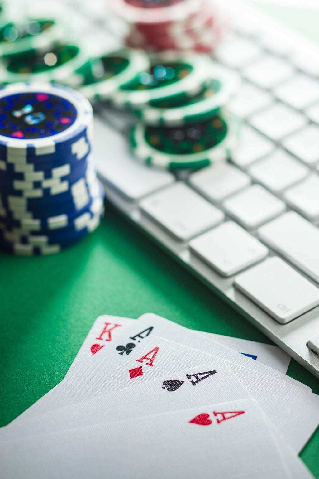 Concept of on-line poker game. Poker cards and keyboard.