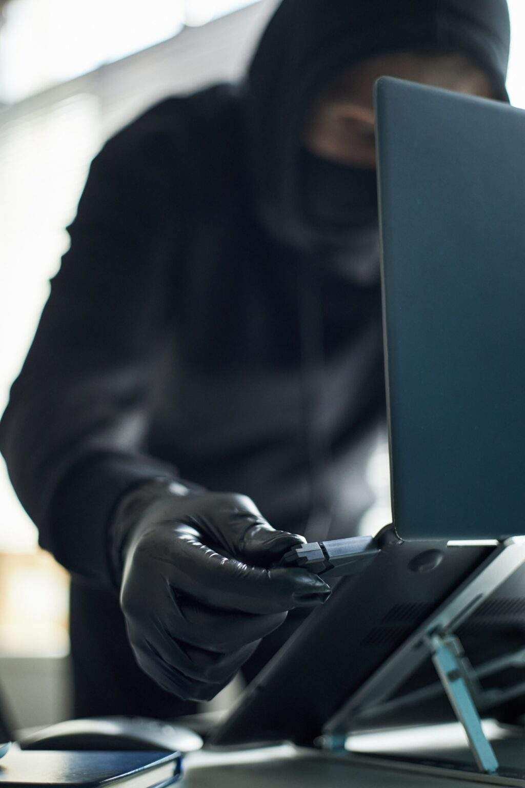 Unrecognizable Man Hacking Computer System Using Malware on Usb Device
